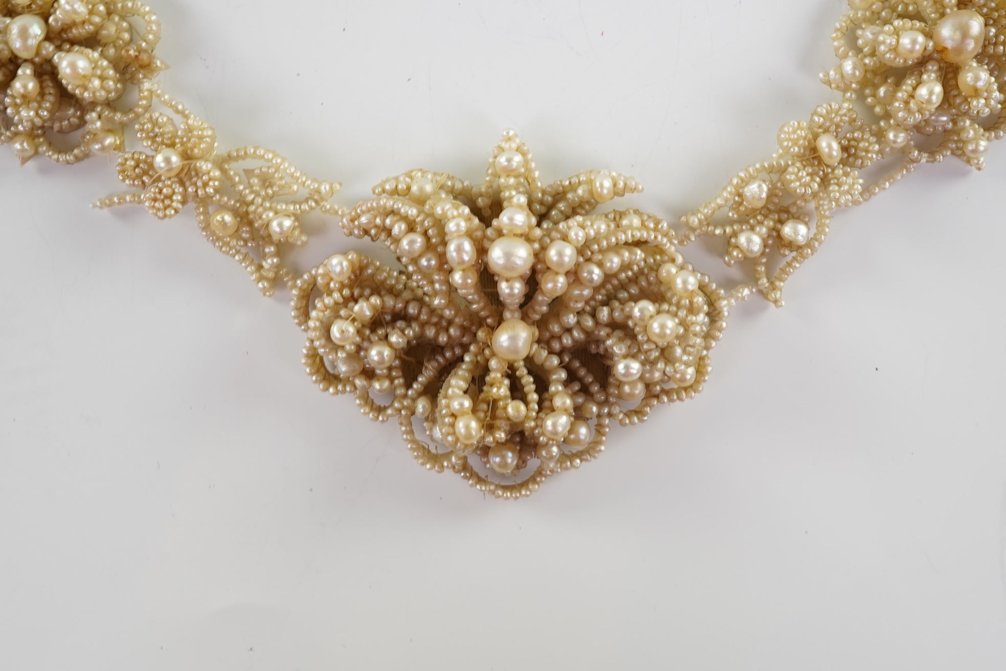 A Regency seed pearl necklace, brooch and pair of earrings, early 19th century
